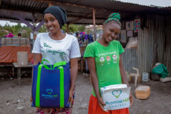 2-cute-girls-holding-PHP-bags