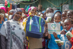 Slum-12.great-smiles-show-gratitude-and-excellent-brand-placement-for-Promise-Hill